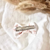 Barrette noeud papillon | Fleurs roses