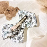 Barrette noeud papillon | Fleurs bleues